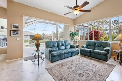 Privacy abounds with this well maintained 3/2/2 pool home on Pinemoor West Golf Club in Florida - for sale on GolfHomes.com, golf home, golf lot