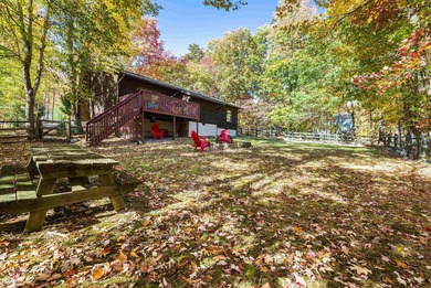 Tucked away in the woods of Massanutten, this beautiful home on Woodstone Meadows Golf Course At Massanutten in Virginia - for sale on GolfHomes.com, golf home, golf lot