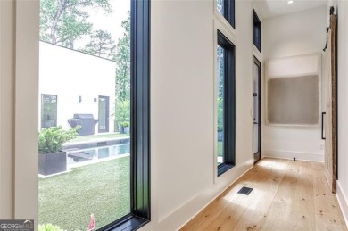 Welcome to this stunning contemporary gem, one of only 5 homes on Druid Hills Golf Club in Georgia - for sale on GolfHomes.com, golf home, golf lot