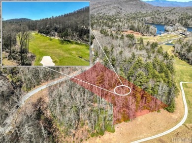 This 1 acre lot while gently sloping, overlooks the 17th green on Lake Toxaway Country Club in North Carolina - for sale on GolfHomes.com, golf home, golf lot