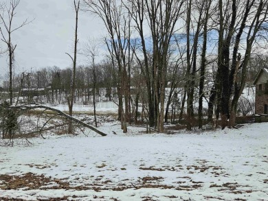 This lot is on the Christmas Lake Golf Course and walking on Christmas Lake Golf Course in Indiana - for sale on GolfHomes.com, golf home, golf lot