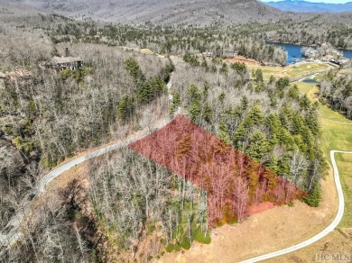 This 1 acre lot while gently sloping, overlooks the 17th green on Lake Toxaway Country Club in North Carolina - for sale on GolfHomes.com, golf home, golf lot