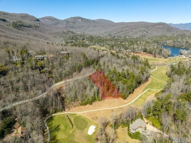 This 1 acre lot while gently sloping, overlooks the 17th green on Lake Toxaway Country Club in North Carolina - for sale on GolfHomes.com, golf home, golf lot