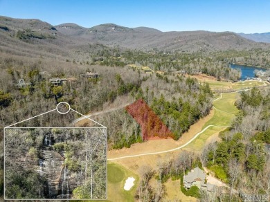 This 1 acre lot while gently sloping, overlooks the 17th green on Lake Toxaway Country Club in North Carolina - for sale on GolfHomes.com, golf home, golf lot