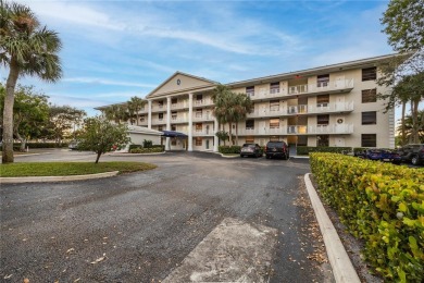 GREAT 2 BEDROOM 2 BATH WHITEHALL CONDO LOCATED IN THE PRIVATE on Pine Island Ridge Country Club in Florida - for sale on GolfHomes.com, golf home, golf lot