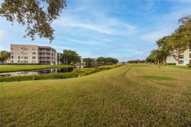 GREAT 2 BEDROOM 2 BATH WHITEHALL CONDO LOCATED IN THE PRIVATE on Pine Island Ridge Country Club in Florida - for sale on GolfHomes.com, golf home, golf lot