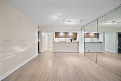 GREAT 2 BEDROOM 2 BATH WHITEHALL CONDO LOCATED IN THE PRIVATE on Pine Island Ridge Country Club in Florida - for sale on GolfHomes.com, golf home, golf lot