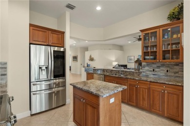 Beautiful second-floor Merano residence with elevator, located on The Colony Golf and Country Club in Florida - for sale on GolfHomes.com, golf home, golf lot