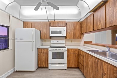 GREAT 2 BEDROOM 2 BATH WHITEHALL CONDO LOCATED IN THE PRIVATE on Pine Island Ridge Country Club in Florida - for sale on GolfHomes.com, golf home, golf lot