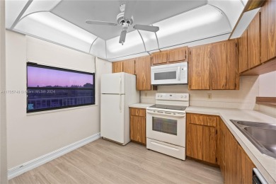 GREAT 2 BEDROOM 2 BATH WHITEHALL CONDO LOCATED IN THE PRIVATE on Pine Island Ridge Country Club in Florida - for sale on GolfHomes.com, golf home, golf lot