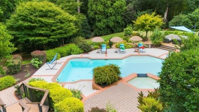 Nestled on a private, one-acre lot just moments from Highway 400 on Cherokee Town and Country Club in Georgia - for sale on GolfHomes.com, golf home, golf lot