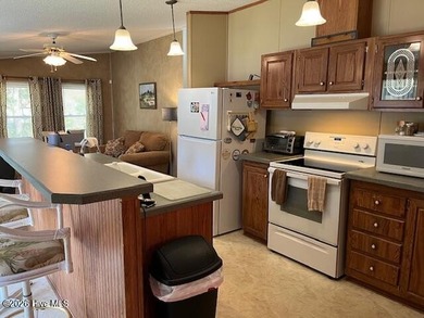 Located at the end of a cul-de-sac, this spacious 3BR/2BA home on Ocean Ridge Plantation in North Carolina - for sale on GolfHomes.com, golf home, golf lot