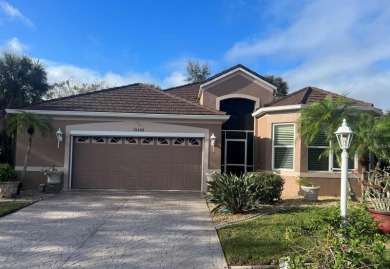 Exceptional value and privacy await! This extended Antiqua model on Seminole Lakes Country Club in Florida - for sale on GolfHomes.com, golf home, golf lot