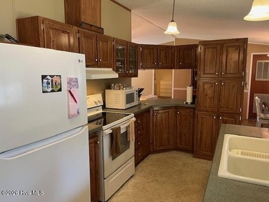 Located at the end of a cul-de-sac, this spacious 3BR/2BA home on Ocean Ridge Plantation in North Carolina - for sale on GolfHomes.com, golf home, golf lot