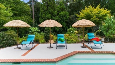 Nestled on a private, one-acre lot just moments from Highway 400 on Cherokee Town and Country Club in Georgia - for sale on GolfHomes.com, golf home, golf lot