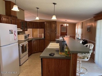 Located at the end of a cul-de-sac, this spacious 3BR/2BA home on Ocean Ridge Plantation in North Carolina - for sale on GolfHomes.com, golf home, golf lot