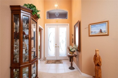 Exceptional value and privacy await! This extended Antiqua model on Seminole Lakes Country Club in Florida - for sale on GolfHomes.com, golf home, golf lot