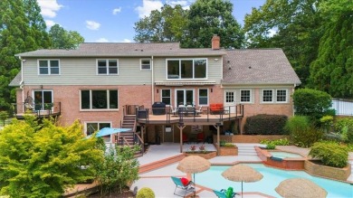 Nestled on a private, one-acre lot just moments from Highway 400 on Cherokee Town and Country Club in Georgia - for sale on GolfHomes.com, golf home, golf lot