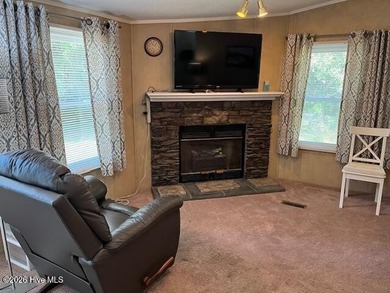 Located at the end of a cul-de-sac, this spacious 3BR/2BA home on Ocean Ridge Plantation in North Carolina - for sale on GolfHomes.com, golf home, golf lot