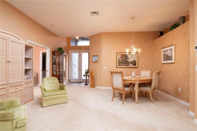 Exceptional value and privacy await! This extended Antiqua model on Seminole Lakes Country Club in Florida - for sale on GolfHomes.com, golf home, golf lot