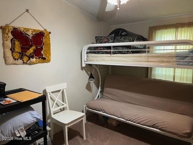 Located at the end of a cul-de-sac, this spacious 3BR/2BA home on Ocean Ridge Plantation in North Carolina - for sale on GolfHomes.com, golf home, golf lot