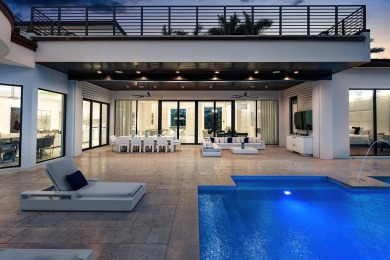 Style, space, and function come together to create perfection in on St. Andrews Country Club of Boca Raton in Florida - for sale on GolfHomes.com, golf home, golf lot