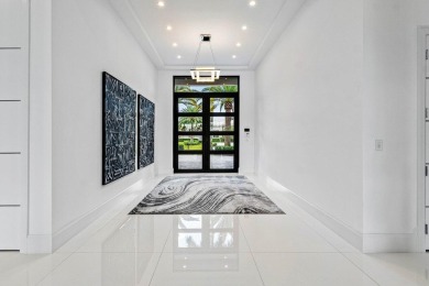 Style, space, and function come together to create perfection in on St. Andrews Country Club of Boca Raton in Florida - for sale on GolfHomes.com, golf home, golf lot
