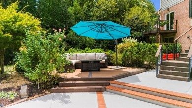 Nestled on a private, one-acre lot just moments from Highway 400 on Cherokee Town and Country Club in Georgia - for sale on GolfHomes.com, golf home, golf lot