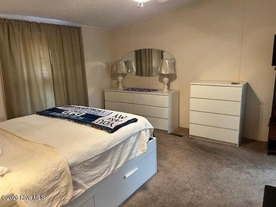 Located at the end of a cul-de-sac, this spacious 3BR/2BA home on Ocean Ridge Plantation in North Carolina - for sale on GolfHomes.com, golf home, golf lot