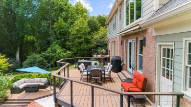 Nestled on a private, one-acre lot just moments from Highway 400 on Cherokee Town and Country Club in Georgia - for sale on GolfHomes.com, golf home, golf lot