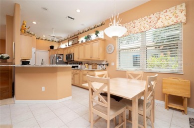 Exceptional value and privacy await! This extended Antiqua model on Seminole Lakes Country Club in Florida - for sale on GolfHomes.com, golf home, golf lot