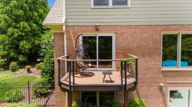 Nestled on a private, one-acre lot just moments from Highway 400 on Cherokee Town and Country Club in Georgia - for sale on GolfHomes.com, golf home, golf lot