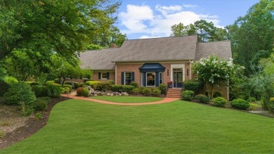 Nestled on a private, one-acre lot just moments from Highway 400 on Cherokee Town and Country Club in Georgia - for sale on GolfHomes.com, golf home, golf lot