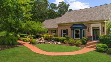 Nestled on a private, one-acre lot just moments from Highway 400 on Cherokee Town and Country Club in Georgia - for sale on GolfHomes.com, golf home, golf lot