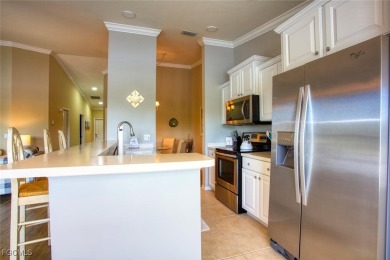 Enjoy sweeping views of the golf course, lake, and wooded on Heritage Palms Golf and Country Club in Florida - for sale on GolfHomes.com, golf home, golf lot