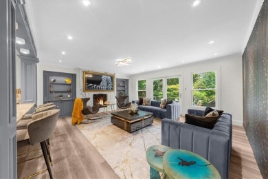 Nestled on a private, one-acre lot just moments from Highway 400 on Cherokee Town and Country Club in Georgia - for sale on GolfHomes.com, golf home, golf lot