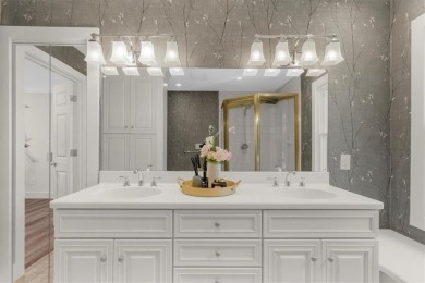 Nestled on a private, one-acre lot just moments from Highway 400 on Cherokee Town and Country Club in Georgia - for sale on GolfHomes.com, golf home, golf lot