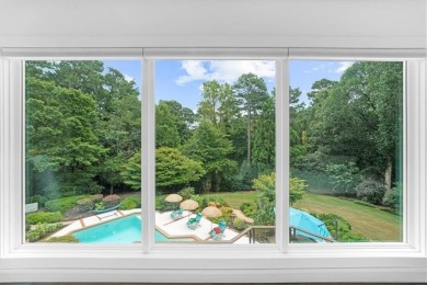 Nestled on a private, one-acre lot just moments from Highway 400 on Cherokee Town and Country Club in Georgia - for sale on GolfHomes.com, golf home, golf lot