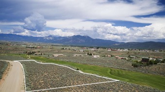 A perfectly located lot in the Taos Country Club Subdivision on Taos Country Club in New Mexico - for sale on GolfHomes.com, golf home, golf lot