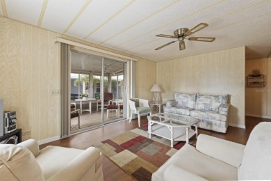 This 1979 two bedroom, two bathroom home may be the perfect on Maple Leaf Golf and Country Club in Florida - for sale on GolfHomes.com, golf home, golf lot