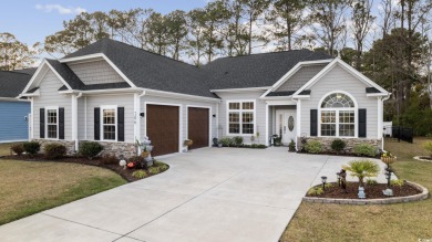 Discover coastal elegance nestled in the tranquil Windsong on Cypress Bay Golf Club in South Carolina - for sale on GolfHomes.com, golf home, golf lot