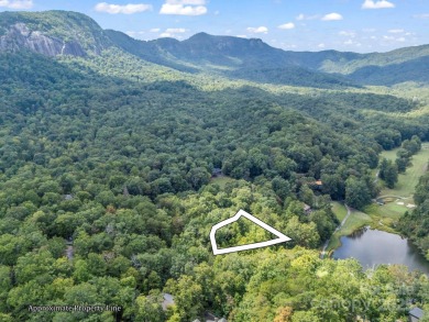 This rare and easily buildable mountain lot sits on the scenic on Rumbling Bald Resort on Lake Lure in North Carolina - for sale on GolfHomes.com, golf home, golf lot