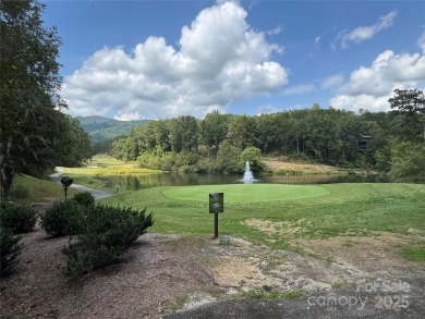 This rare and easily buildable mountain lot sits on the scenic on Rumbling Bald Resort on Lake Lure in North Carolina - for sale on GolfHomes.com, golf home, golf lot