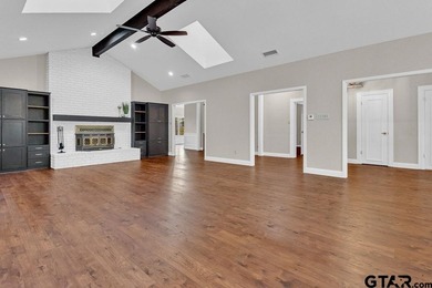 This beautifully updated home strikes that perfect balance on Hide-A-Way Lake Golf Course in Texas - for sale on GolfHomes.com, golf home, golf lot