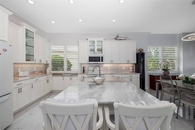 SIGNIFICANT PRICE REDUCTION on this completely updated VILLA on  in Florida - for sale on GolfHomes.com, golf home, golf lot