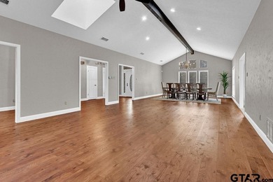 This beautifully updated home strikes that perfect balance on Hide-A-Way Lake Golf Course in Texas - for sale on GolfHomes.com, golf home, golf lot