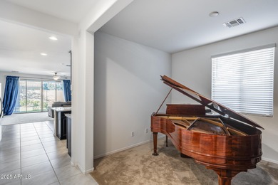 Modern golf course living with 3-car garage and resort-style on Verrado Golf Club  in Arizona - for sale on GolfHomes.com, golf home, golf lot