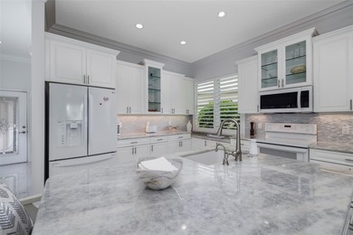 SIGNIFICANT PRICE REDUCTION on this completely updated VILLA on  in Florida - for sale on GolfHomes.com, golf home, golf lot