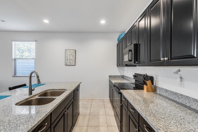 Modern golf course living with 3-car garage and resort-style on Verrado Golf Club  in Arizona - for sale on GolfHomes.com, golf home, golf lot