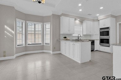 This beautifully updated home strikes that perfect balance on Hide-A-Way Lake Golf Course in Texas - for sale on GolfHomes.com, golf home, golf lot